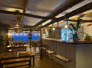 a living room with a view of the ocean at Coco Cabaña Barú in Cartagena de Indias
