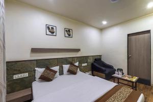 Postel nebo postele na pokoji v ubytování Hotel City Inn