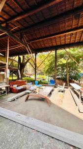 a group of tables and chairs in a pavilion at 神庭武道館 in Chichibu