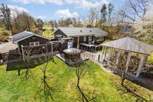 an aerial view of a house with a gazebo at LF14223-Roslev-Livovej-9 in Roslev