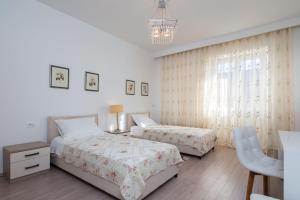 Postel nebo postele na pokoji v ubytování Apartment Vuko