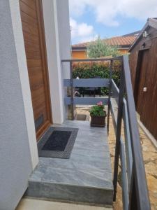 a stairway leading up to a house with a door at Villa Müller in Poreč