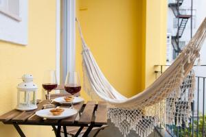 Кът за сядане в ALTIDO Cosy 2BR Apt with terrace in Penha de França, 5mins from the Viewpoint of Monte Agudo