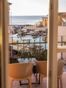 a view of a marina from a balcony at Art Hotel Tartini in Piran
