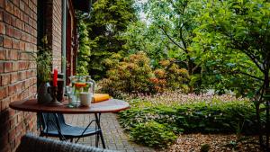 a table sitting on the side of a patio at KASTANIENHOF in Burg +10 photos