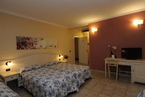 A bed or beds in a room at Hotel Sextum