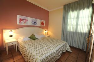 A bed or beds in a room at Hotel Sextum