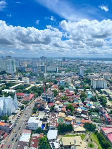 an aerial view of a city with buildings at Horizons 101-Premium Studio 42J in Cebu City