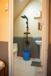 a bathroom with a toilet and a sink at Lukay Guest House in Siquijor in Lazi +27 photos