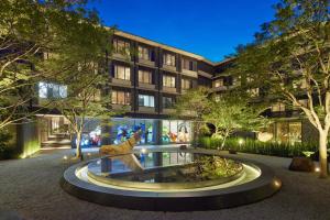a building with a fountain in front of a building at THE HOTEL HIGASHIYAMA KYOTO TOKYU, A Pan Pacific Hotel in Kyoto