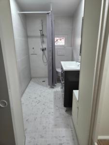 a bathroom with a shower and a sink at Le chemin du bonheur in Nyons +11 photos