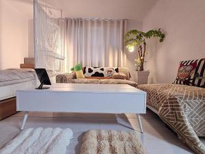 a room with a white piano in a bedroom at Your Stay in Seoul