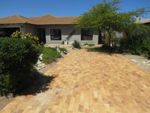 a brick driveway in front of a house at the range in Langebaan
