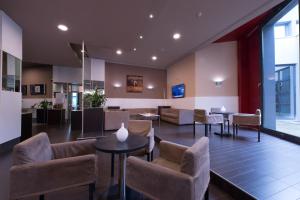 A seating area at Hotel Parma & Congressi