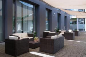 A seating area at Hotel Parma & Congressi
