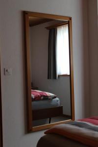 Postel nebo postele na pokoji v ubytování Hus Pravis