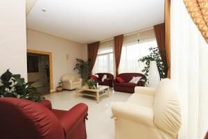A seating area at Hotel Sextum
