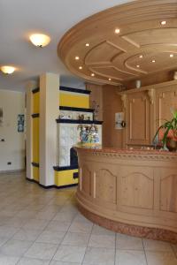 a kitchen with a large island in a room at Agritur Campo Fiorito in Dro