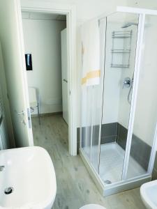 Koupelna v ubytování Residenze Parmensi + 21 fotografií