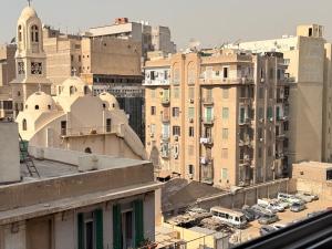 a view of a city with buildings and cars at Moon Homes in Downtown Cairo in Cairo
