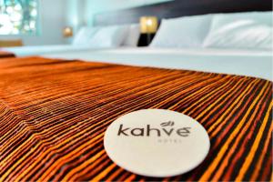 Katil atau katil-katil dalam bilik di Hotel Kahvé
