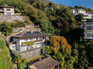 an aerial view of a house on a hill at Casa Sybille, beautiful lake view in Minusio