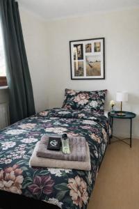 a bedroom with a bed with a tray on it at Annie Järdebergsgatan 3 in Kiruna
