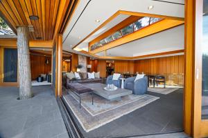 a living room with a couch and a table at Chuckanut Point Villa 2 Bedroom in Bellingham +71 photos