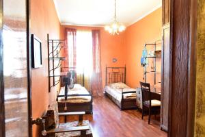a room with two bunk beds and a bedroom at Tbilisi Art Apartment in Tbilisi City