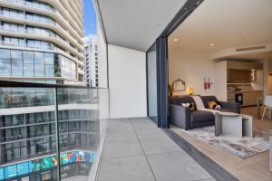 an open living room with a view of a building at Urban Heights - Apartment in St Julian's in St. Julianʼs