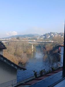 a view of a river from a building at Casa Kilowatt - Amarante in Amarante