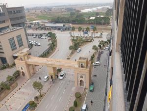 an aerial view of a building with a street at Private & Cozy 2 & 3 Bedroom Full Apartment for Families, Couples & Solo Near Islamabad Airport in Islamabad