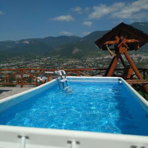 a swimming pool with a water slide in the middle at Gogasar house in Ijevan