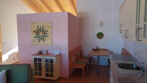 a living room with a sink and a table at Lindenhaus in Zwiesel +42 photos