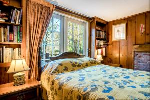 a bedroom with a bed and a window at Highland Ave in Norwalk