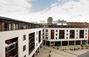 an aerial view of buildings in a city at Coventry Home in Coventry