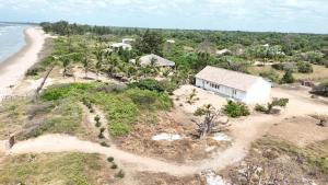 an aerial view of a house on a beach at Baobab Beach Villa 2 in Abémé