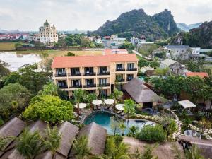 an aerial view of a resort with a swimming pool at La Lua Resort Ninh Binh in Ninh Binh