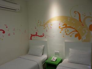 Ένα ή περισσότερα κρεβάτια σε δωμάτιο στο Hotel Strawberry Fields