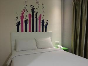 Ένα ή περισσότερα κρεβάτια σε δωμάτιο στο Hotel Strawberry Fields