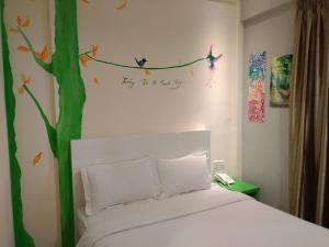 Ένα ή περισσότερα κρεβάτια σε δωμάτιο στο Hotel Strawberry Fields