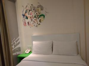 Ένα ή περισσότερα κρεβάτια σε δωμάτιο στο Hotel Strawberry Fields