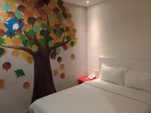 Ένα ή περισσότερα κρεβάτια σε δωμάτιο στο Hotel Strawberry Fields