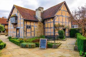 an old building with a sign in front of it at 2 Bed in Hunningham oc-h34740 in Bubbenhall