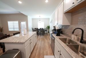 a kitchen with a sink and a counter top at Desoto Rental in Olive Branch