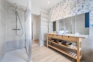 a bathroom with a sink and a shower at Butte du Lion in Genappe +38 photos