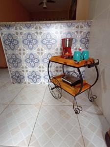 a table with a blender on it in a room at Pousada Flor De Lótus Cipó in Serra do Cipo +98 photos