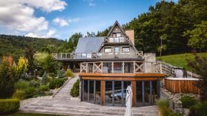 a house on a hill with a wedding at Dom Beskidy in Brenna +79 photos
