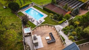 an overhead view of a house with a swimming pool at Dom Beskidy in Brenna