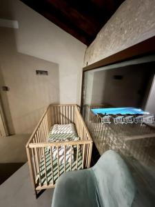 a room with two bunk beds and a couch at Casa da eira in Santo Emilião +13 photos